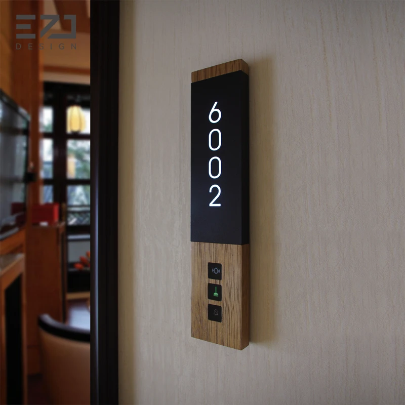Illuminated hotel room identification sign displaying room 6002