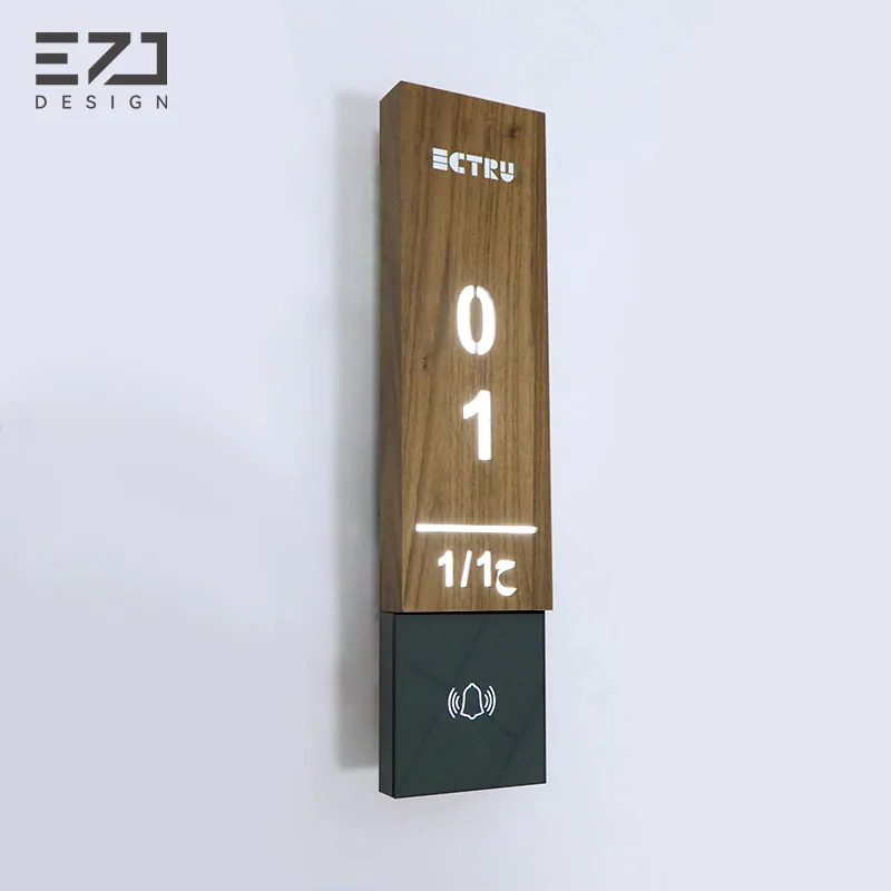 Angled view of a dark walnut-look vertical hotel door sign