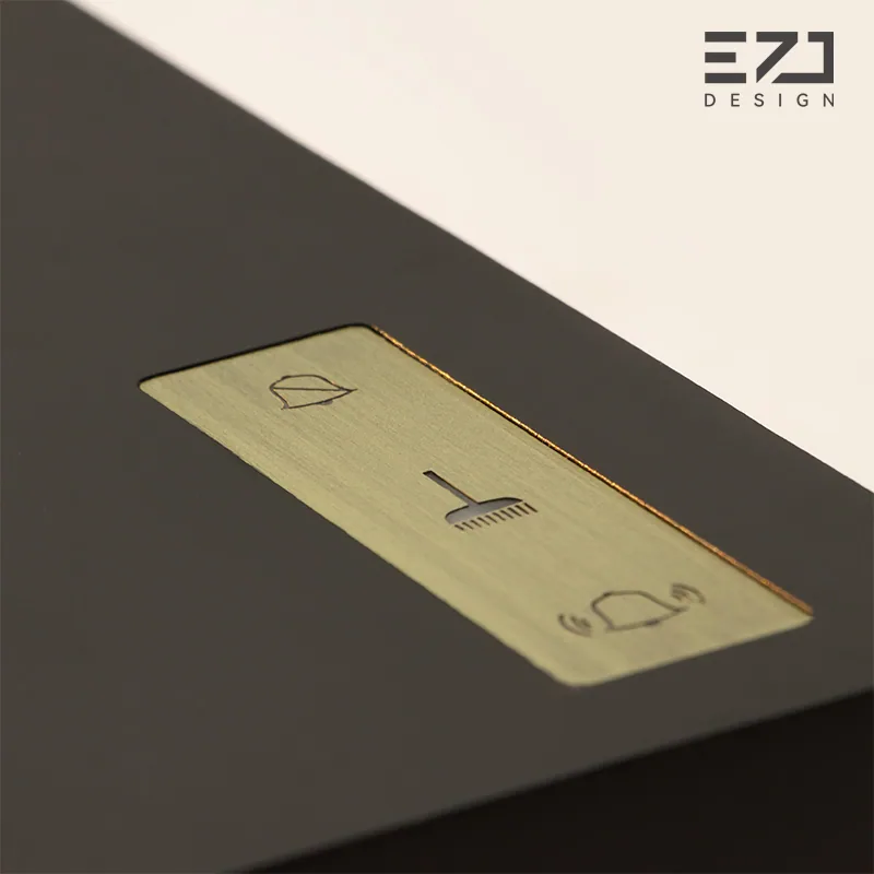 Close view of DND, Make Up Room and doorbell symbols on an electronic hotel door sign