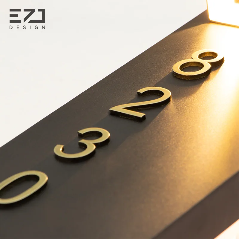 Illuminated room number beneath the top accent light